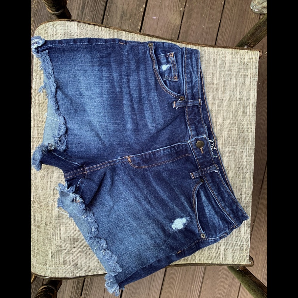 Distressed blue Jean shorts